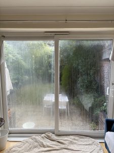 double glazed upvc patio doors full of condensation so you cannot see out into the garden beyond